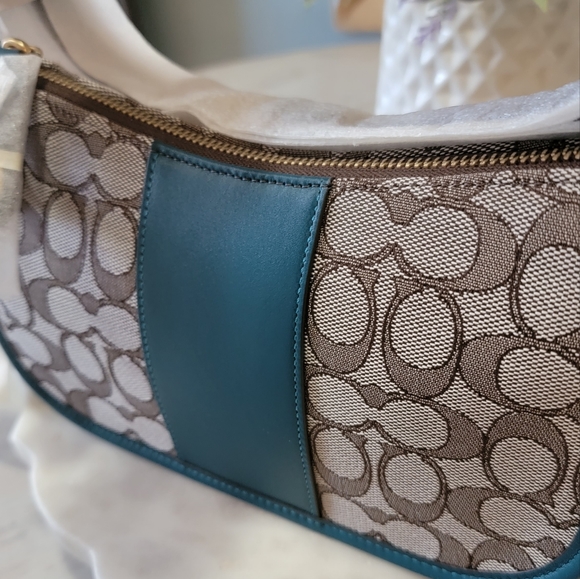 Coach Swinger in signature jacquard with teal color. - Picture 3 of 12